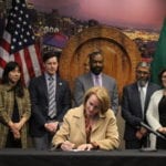 Mayor Durkan signs new Climate EO surrounded by City of Seattle cabinet members